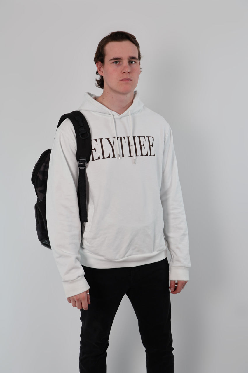 A person is wearing a stylish Nectar Nomad Hoodie and carrying a backpack, standing confidently against a plain background.